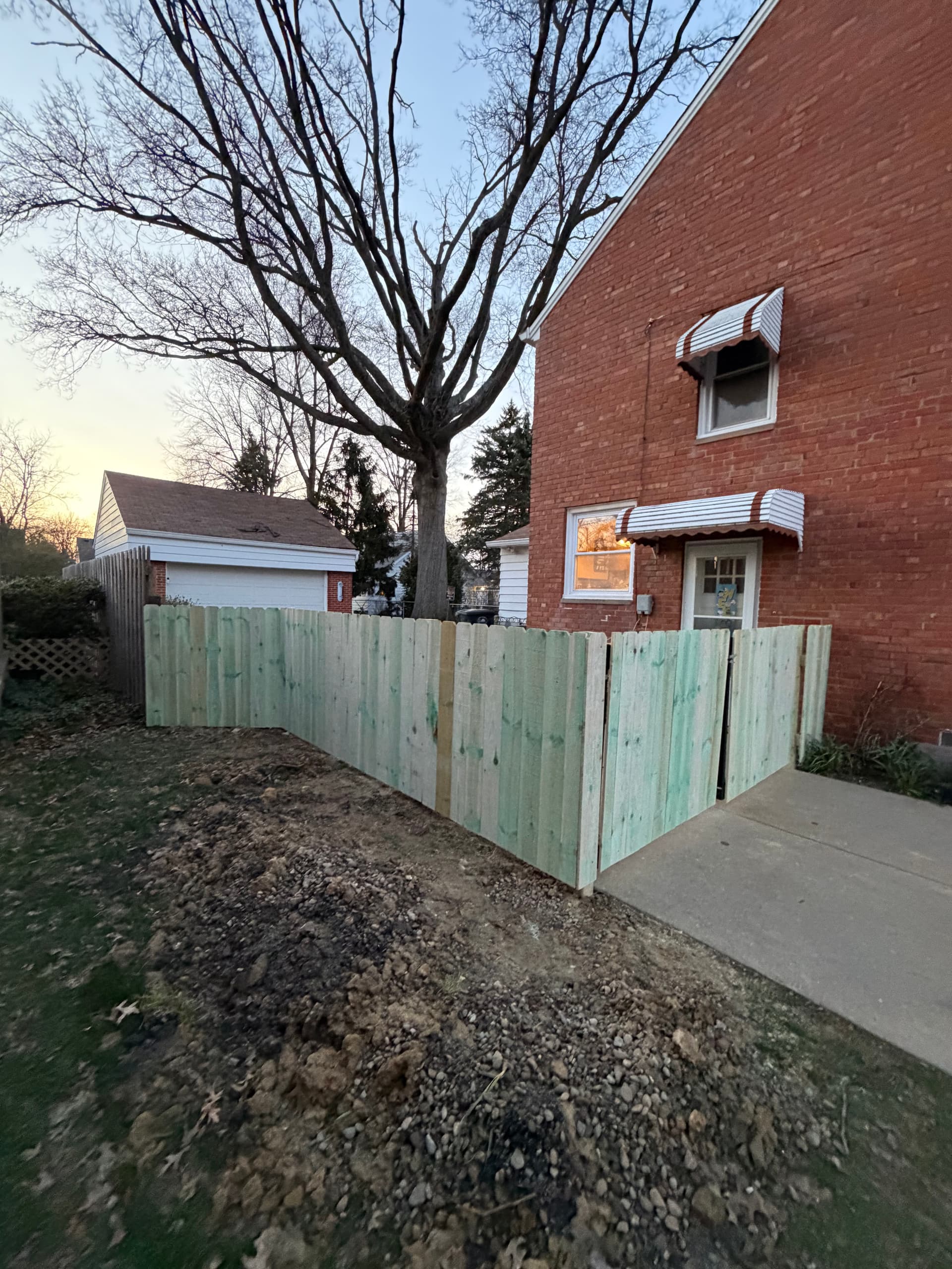 Chain-Link Out, Privacy Fence and Driveway Gate In image